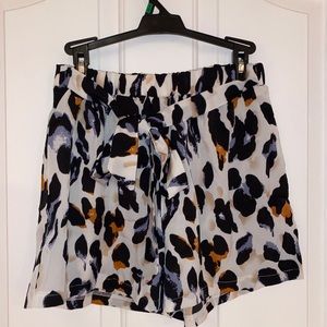 Adorable flowy shorts with tie and elastic waist!